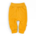 Дитячі однотонні штани з трикотажу на високих манжетах Amber